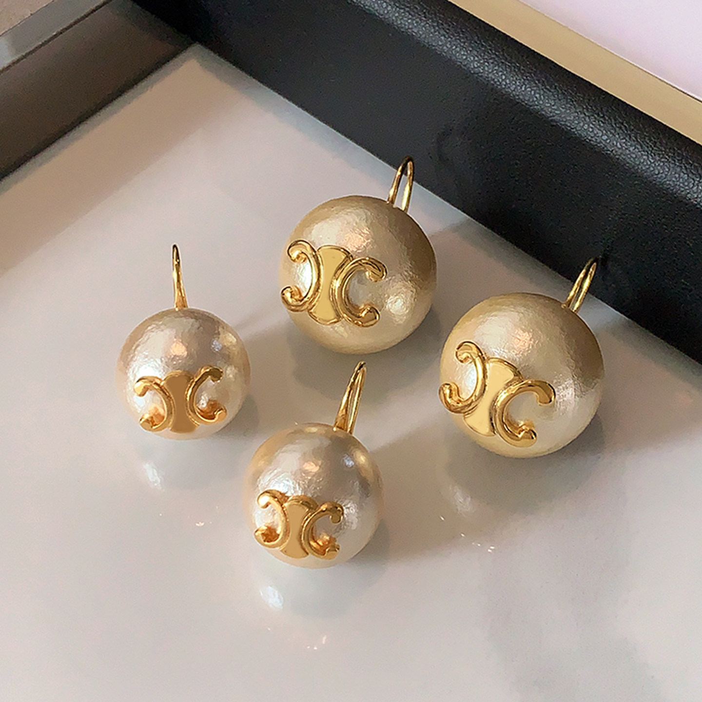 棉花珍珠耳环2026新款爆款高级感凯旋门耳饰轻奢耳勾欧美球球耳坠