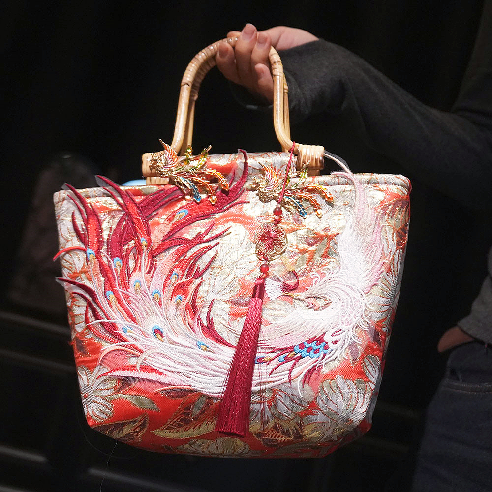 新中式国风包包女婚包水桶包女式2025新款潮流行时尚通勤单肩包