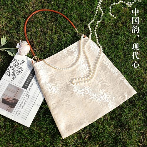 原创国风新中式珍珠手腕包文艺温婉小众手提女包小清新旗袍搭配包