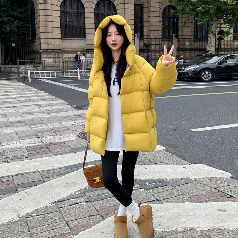 黄色羽绒服女2025冬新款连帽中长款吸铁扣泡芙面包服加厚保暖甜美