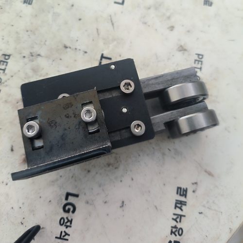 新款双头弹性装置斜口八字封边机配件辅助轮770  750  可安装