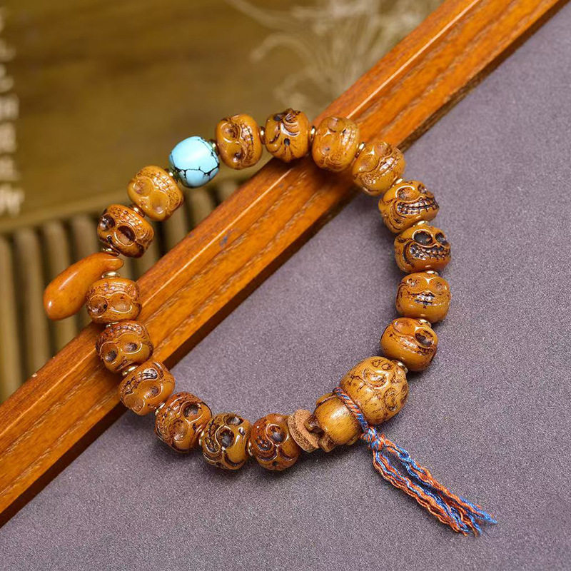 藏传回流牦牛骨雕刻阿呆手串单圈藏式文玩佛珠松狮桶珠雪巴配饰