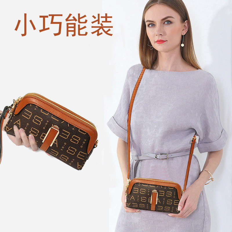 时尚百搭手拿包小斜挎手机包