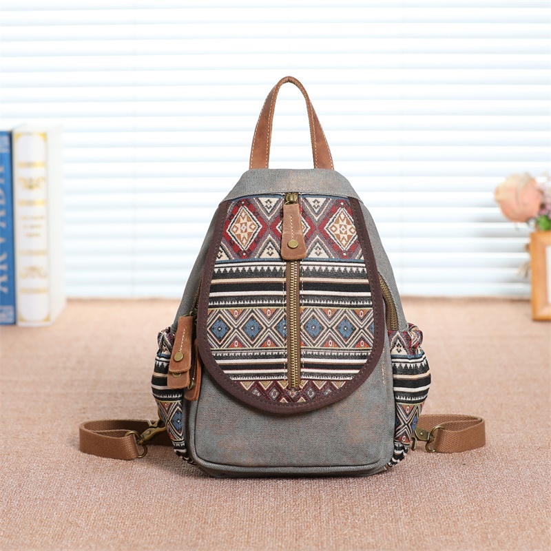 民族风新款牛仔帆布多隔层双肩包