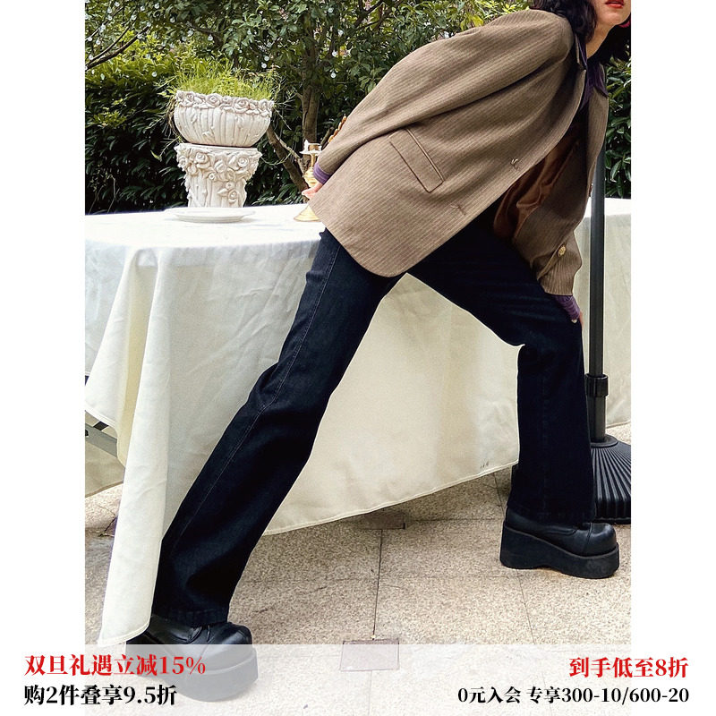 黑色摩登复古微喇加绒牛仔裤