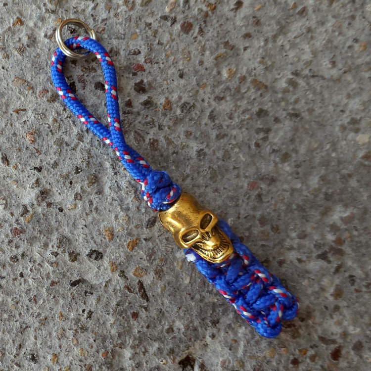 手工编织2mm一芯刀坠 时尚骷髅个性手电筒挂扣 户外配件送锰钢圈