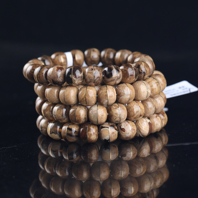 缅甸琥珀黄铜镶嵌一线天手串