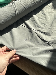 2.5米 青灰色 消光起皱 尼丝纺 6648羽绒服面料（宽1.45米左右）