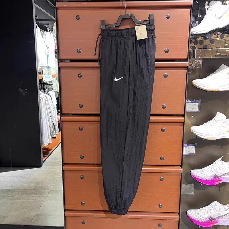 Nike/耐克大勾子夏季女运动梭织薄款速干收口小脚长裤HM9413-010