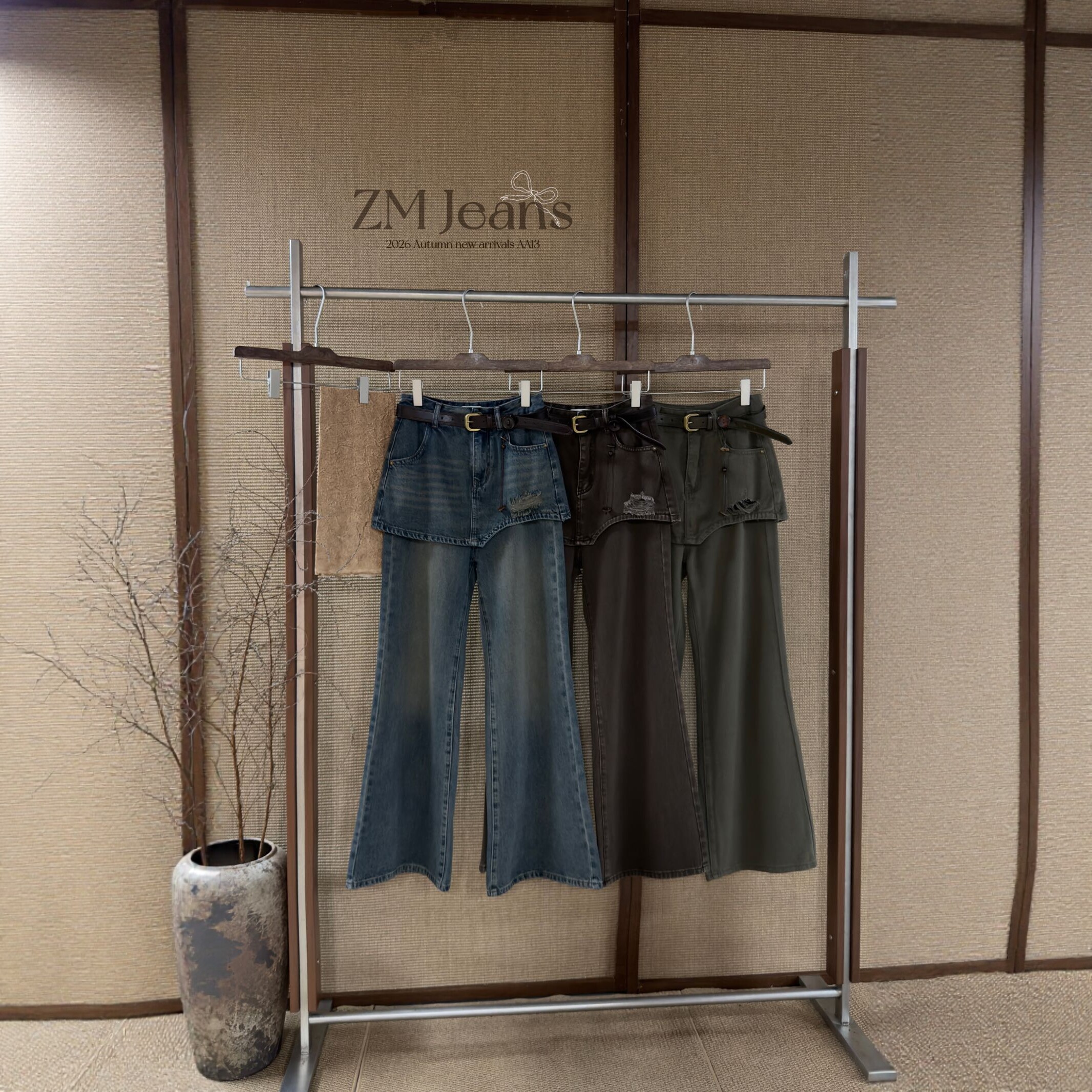 ZM设计感屁帘假两件微喇叭牛仔裤