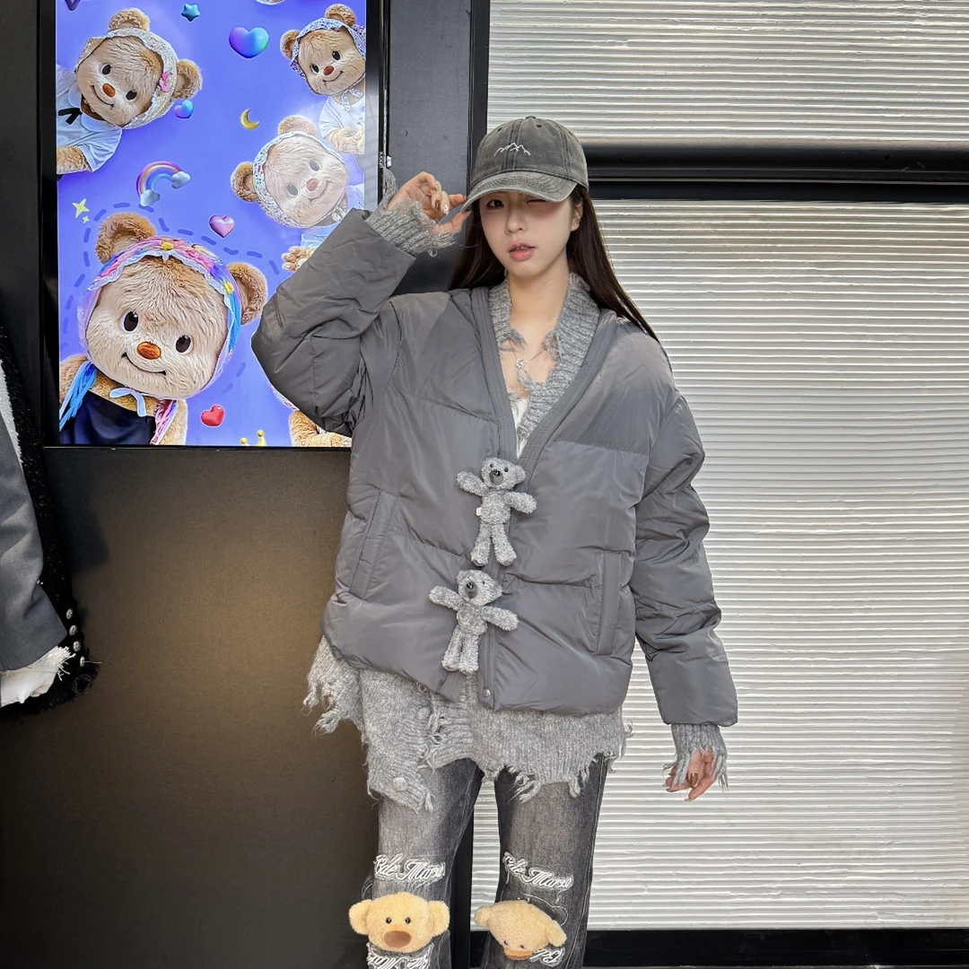 小熊流苏玩偶纽扣假两件羽绒服