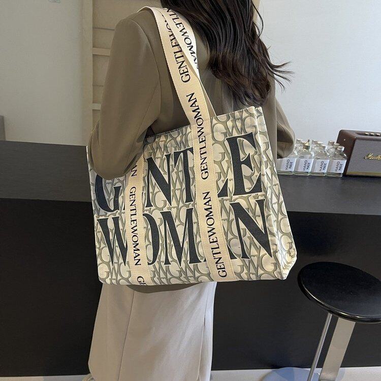 袋鼠 夏季大容量字母女时尚通勤手提购物袋大学生上课单肩托特包