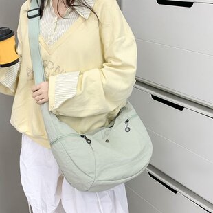 帆布包女大容量2025新款夏季百搭小众设计单肩斜挎包高级感饺子包