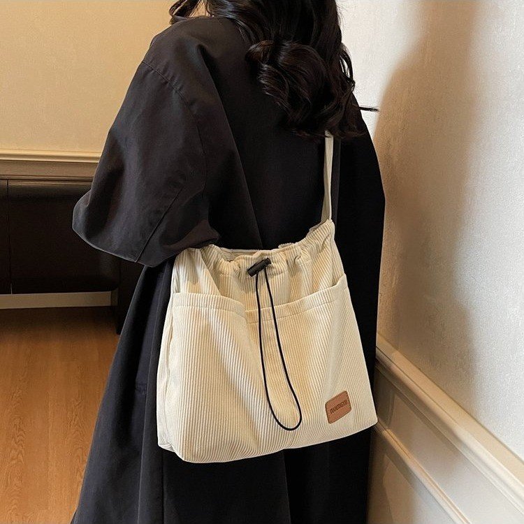 简约灯芯绒布托特包包女新款大容量单肩包百搭学生休闲通勤斜挎包