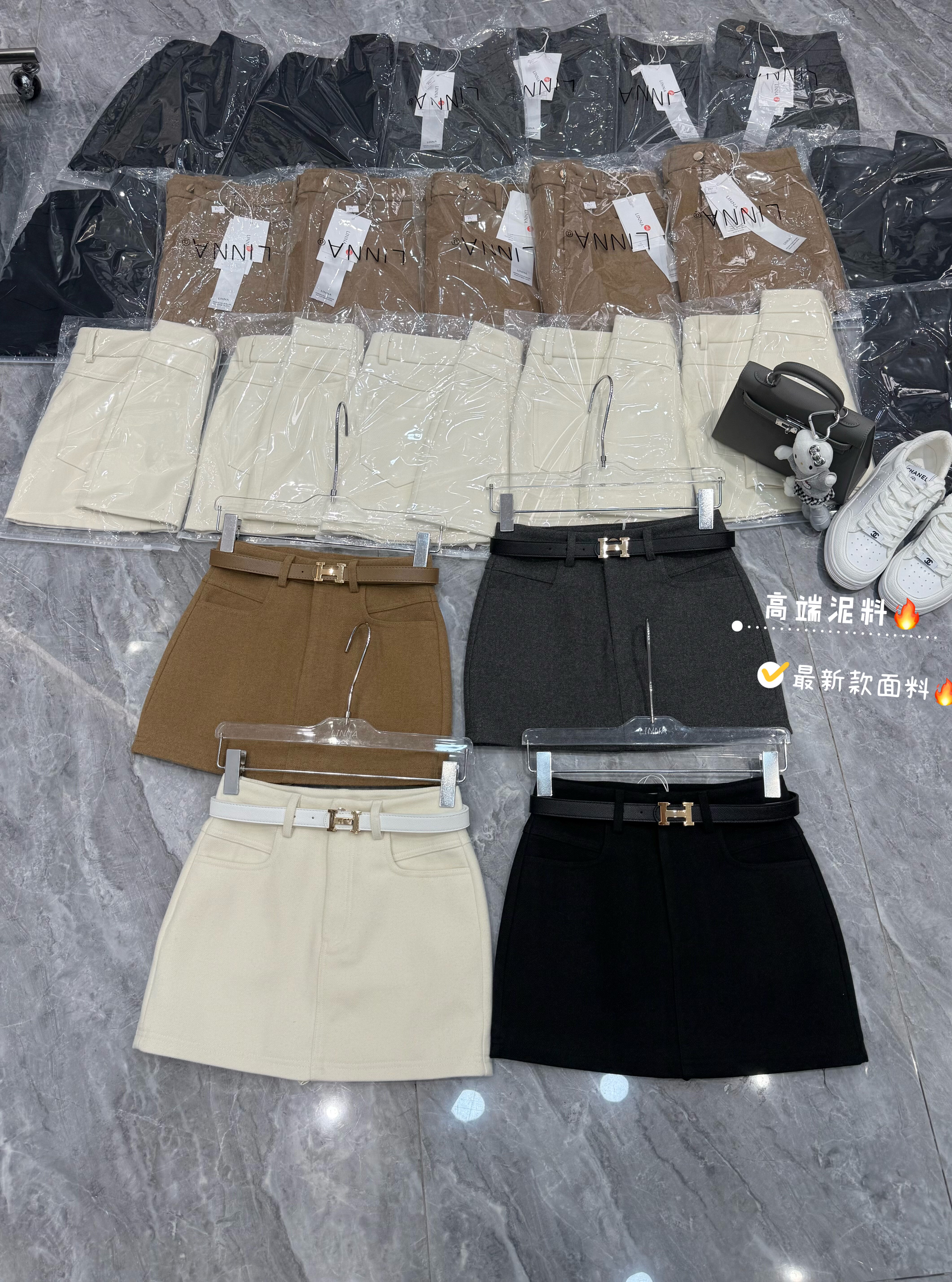 毛呢冬季新款短裙女高腰韩版网红a字修身显瘦半身裙防走光口袋潮