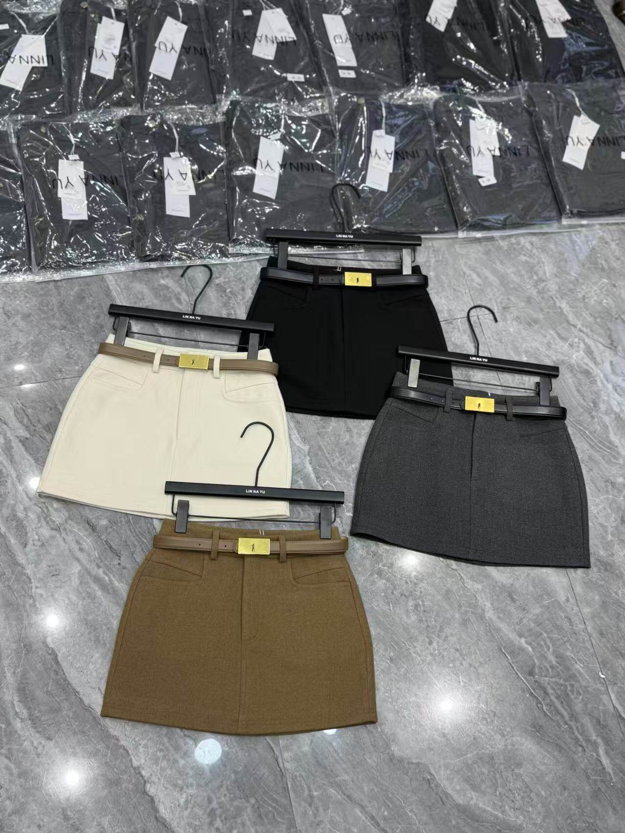 毛呢冬季新款短裙女高腰韩版网红a字修身显瘦半身裙防走光口袋潮
