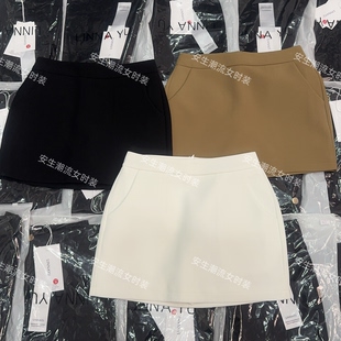 2026春夏新款纯色简约口袋高腰半身裙复古辣妹a字防走光包臀短裙