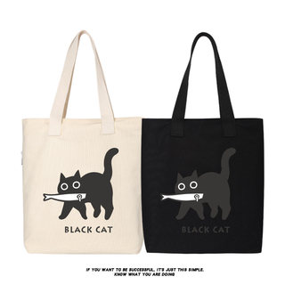 秀洛修猫叼鱼的小黑猫卡通帆布包袋学生手提包斜挎包购物袋子书包