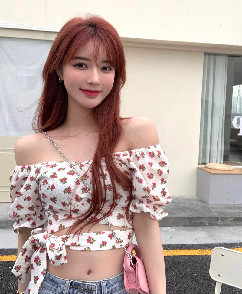 Real price floral top with exposed clavicle design