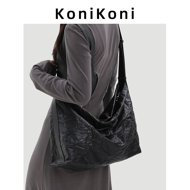 KoniKoni真皮黑色大容量托特包女2026新款超火通勤hobo单肩斜挎包