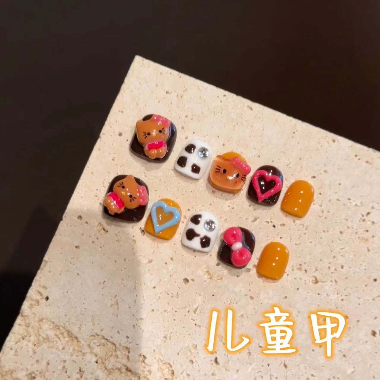 纯手工儿童穿戴甲可爱黑皮猫咪蝴蝶结猫眼波点美甲短款卡通学生