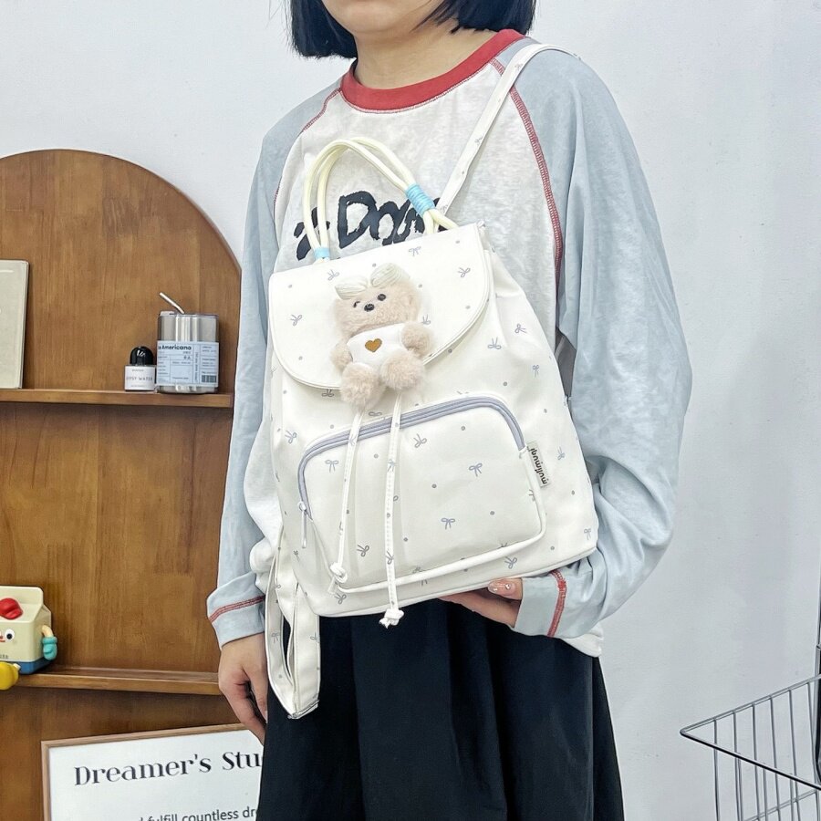 沐里沐气新款抽绳学生百搭双肩背包轻便可爱熊饰休闲小书包少女