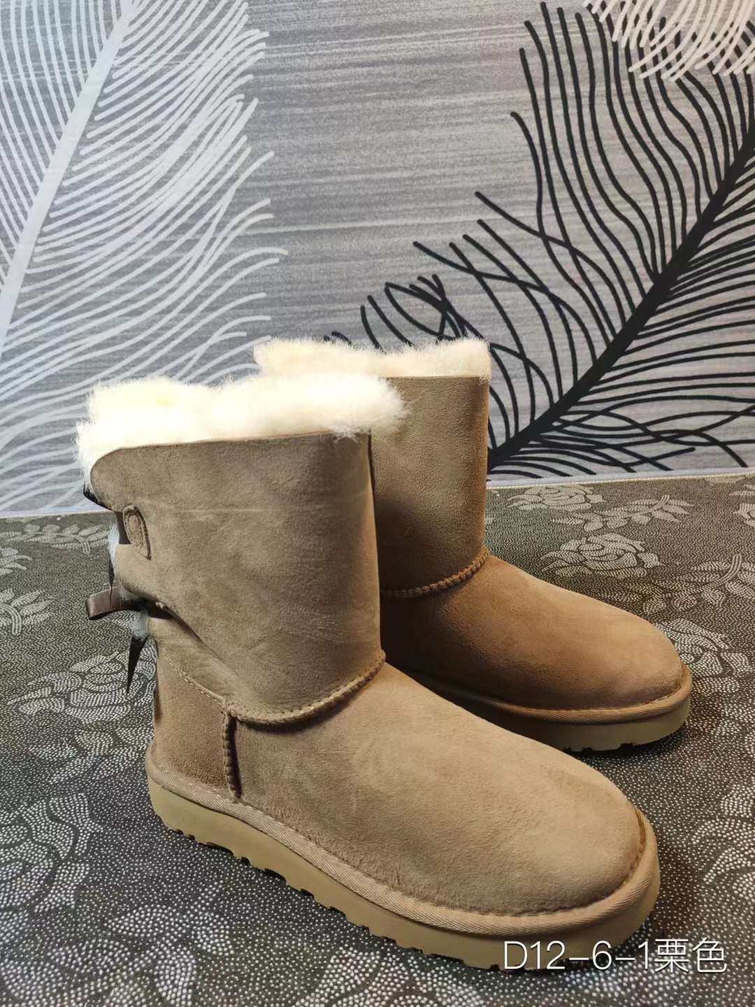 冬季新款真皮羊皮毛一体雪地靴  平跟中筒靴丝带蝴蝶结女靴  12-6
