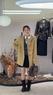 连帽牛角扣外套女冬季2025年新款韩版宽松加厚保暖双面羊毛大衣