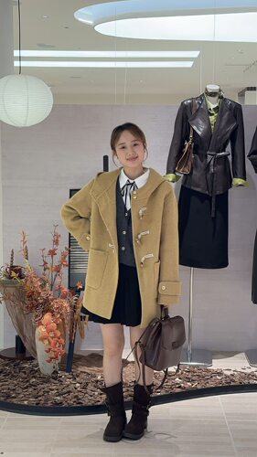 连帽牛角扣外套女冬季2025年新款韩版宽松加厚保暖双面羊毛大衣