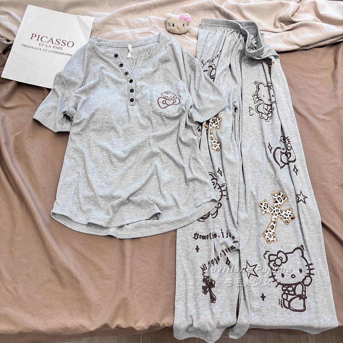 韩系休闲风莫代尔带胸垫睡衣女夏季短袖长裤新款卡通凯蒂猫家居服