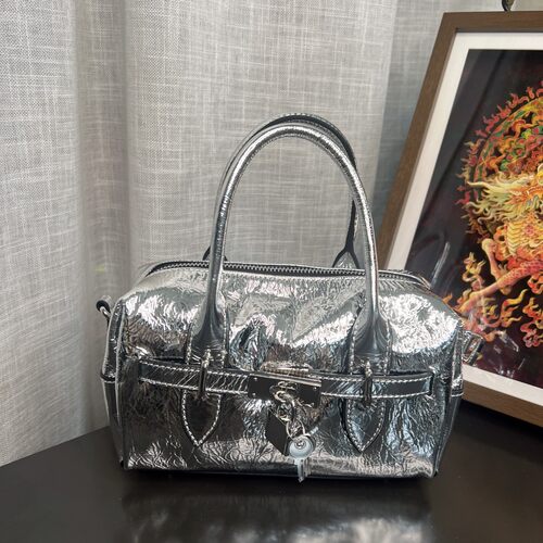 Y29CB527297金属牛皮女包