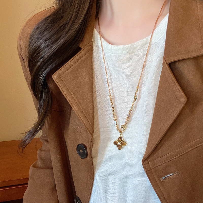 美拉德仿虎眼石四叶花项链女款2025新款长款秋冬毛衣链轻奢高级感