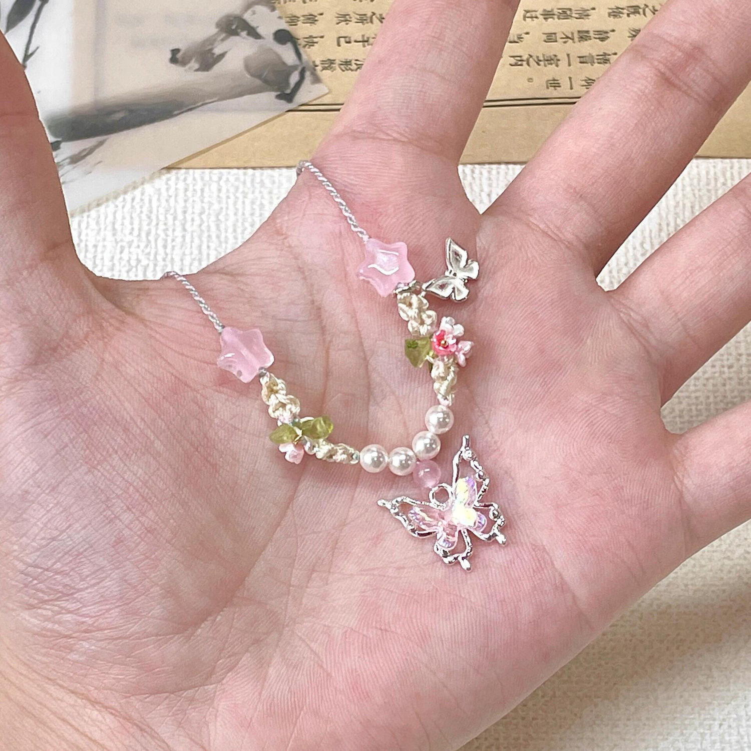 幻彩蓝小蝴蝶手编绳项链女海水蓝夏天配饰2024新款爆款冷清系饰品