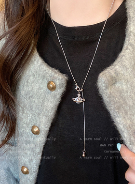 钛钢土星珍珠吊坠项链女2025新款轻奢高级感可抽拉长款毛衣链配饰