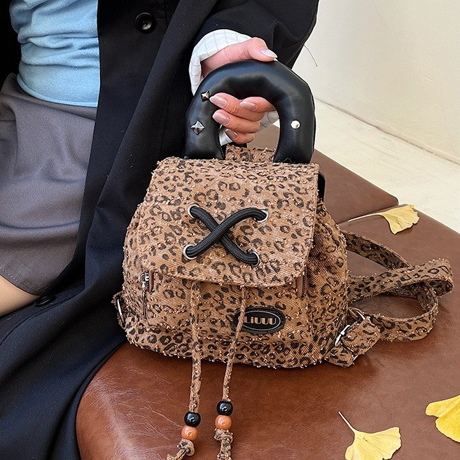 小众豹纹双肩包女2025新款