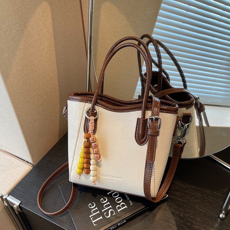 简约手提小包包女2026春季新款复古百搭通勤包小众设计斜挎水桶包,箱包皮具/热销女包/男包,胸包,淘宝优惠券,粉丝福利购,淘宝优惠卷