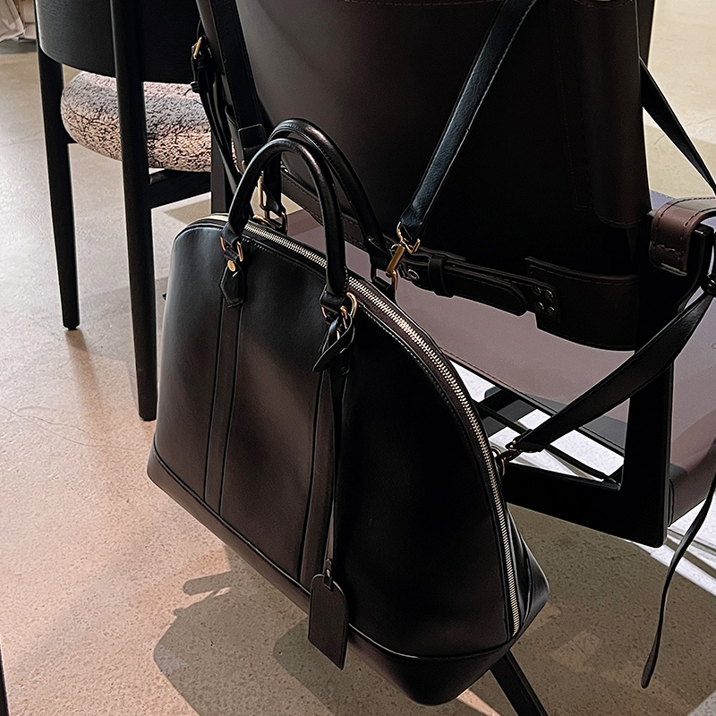 软皮通勤双肩贝壳包2025新款肩斜手提包复古中性书包多用旅行背包