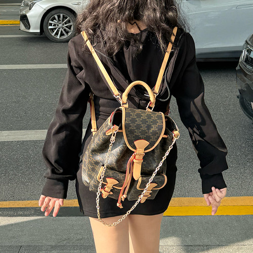 中古口袋双肩包女2026新款休闲链条单肩腋下书包印花抽带通勤背包