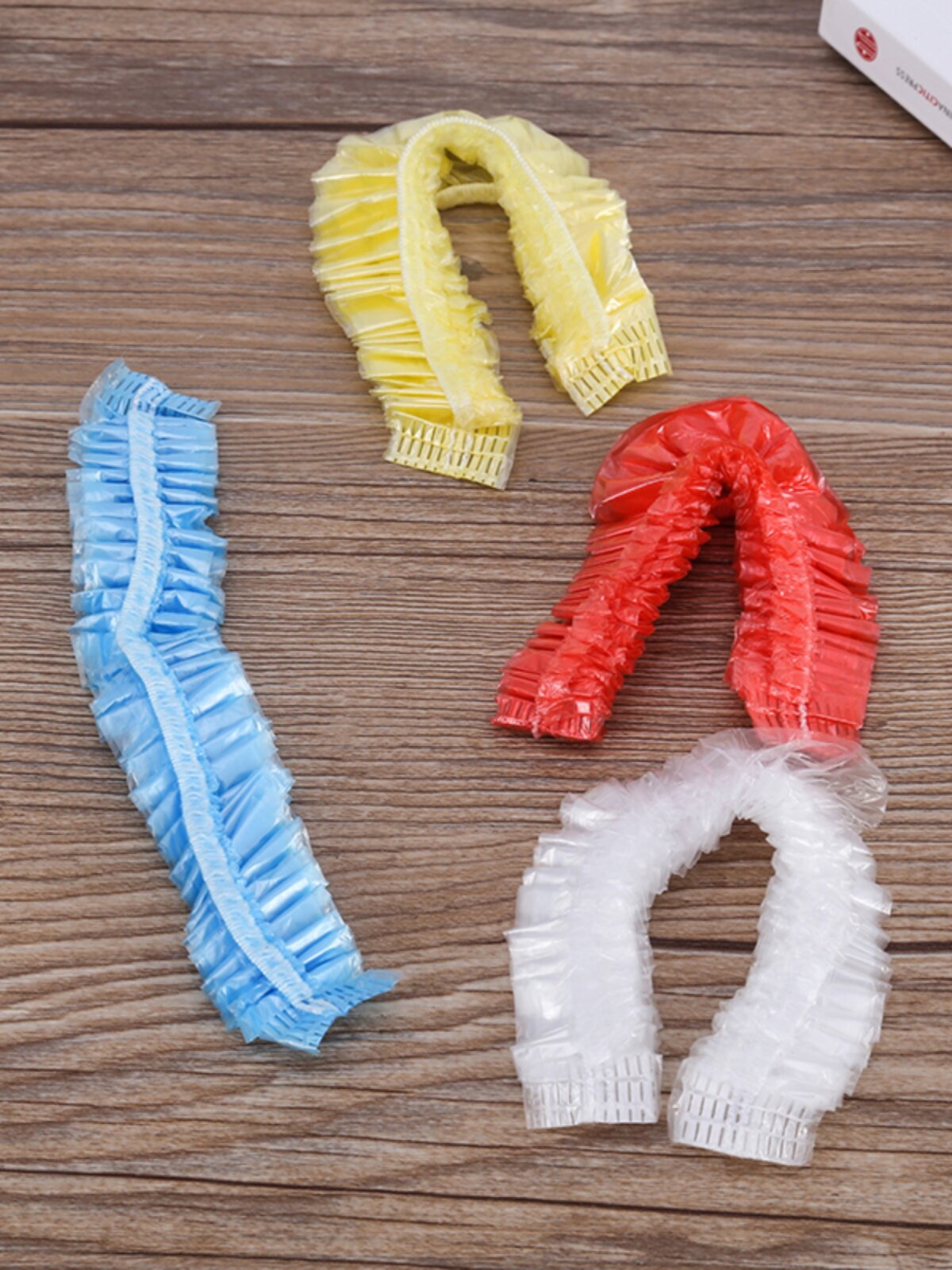 100 PIECES OF THICKENED WATERPROOF ADULT DISPOSABLE SHOWER CAPS HOTEL BATHS WOMENS SHAMPOOS PLASTIC BAKED OIL HATS