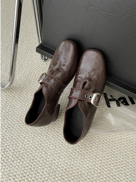 Brown leather slip-on shoes with buckle straps