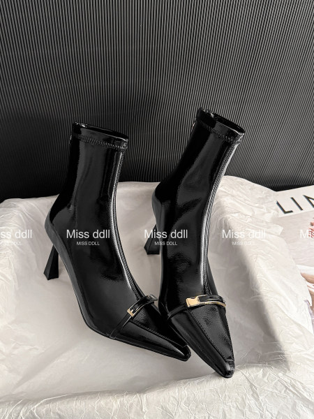 Black glossy pointed-toe ankle boots with high heels