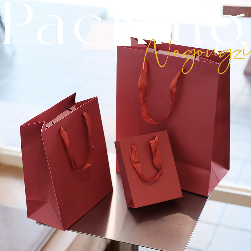 玫红色服装手提袋礼品袋加厚白卡纸袋购物袋礼品袋包装袋批发印刷
