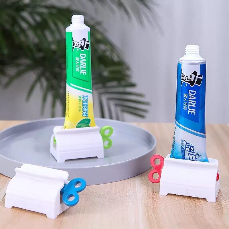 懒人挤牙膏神器 创意简约牙膏夹洗面奶按压器 儿童手动牙膏挤压器