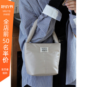 梵花不语新款简约手提包女小众羽绒手拎包布包出门上班百搭水桶包