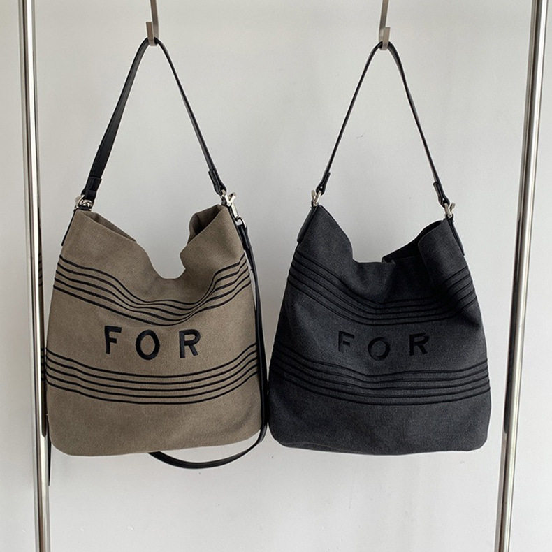 潮流复古大容量水洗帆布包水桶包女百搭斜挎单肩字母包