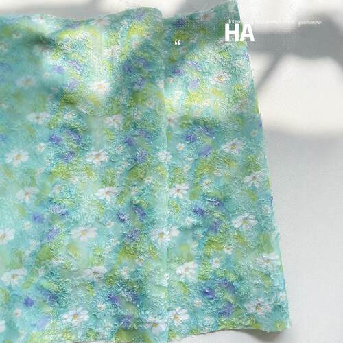 清新绿色童装提花布娃衣面料