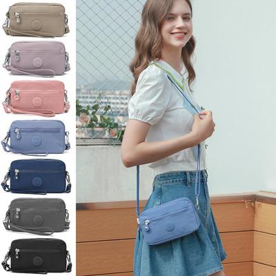 双拉链多卡位斜挎手拿包Mindesa