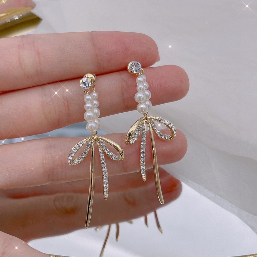 欧比雅比2023年新款小众设计感气质个性夸张蝴蝶结高级珍珠耳环女-封面