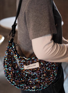 小众紫色亮片牛仔女生通勤单肩月牙斜挎包腋下包牛角包巨好看新款