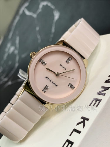 现货美国anne klein淡粉色陶瓷表带珍珠贝母表盘简约女士石英手表